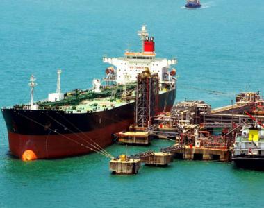 Merchant ship loading at dock