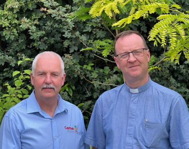 Greg Evans and John Attenborough posing for a picture together