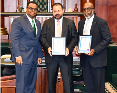 L - R: MLA Chris Saunders, Kenrick Ebanks, Philip Barnes